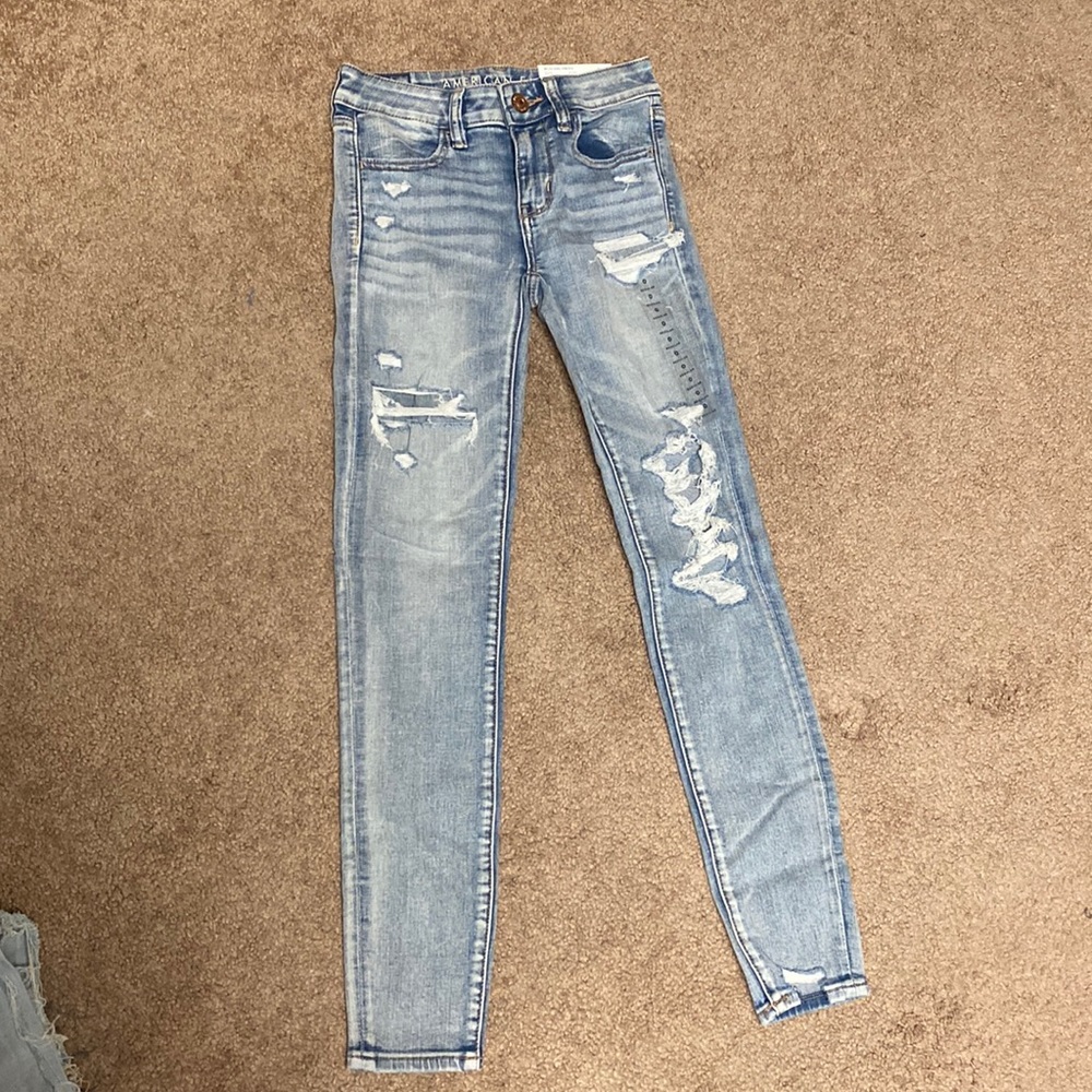 Light wash distressed jeans